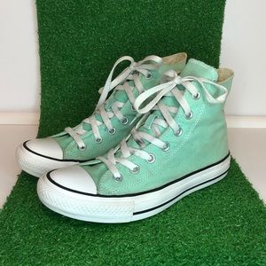 Mint green Converse high tops